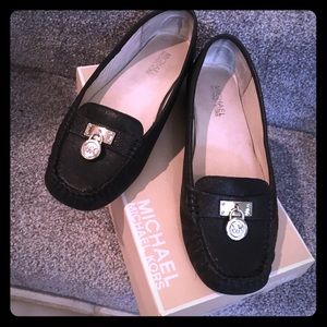 MK black leather flats